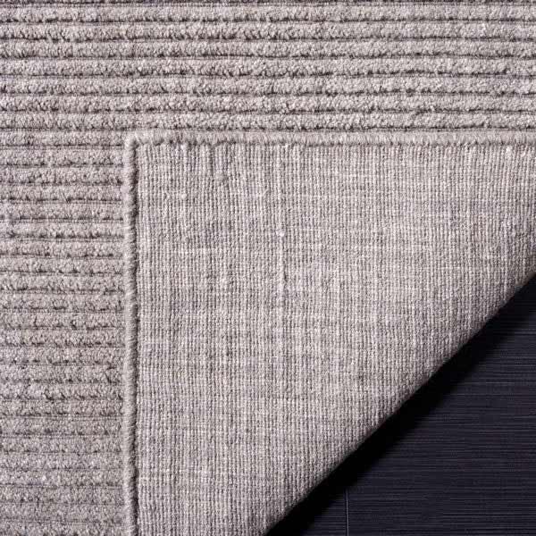 wool loomed area rug